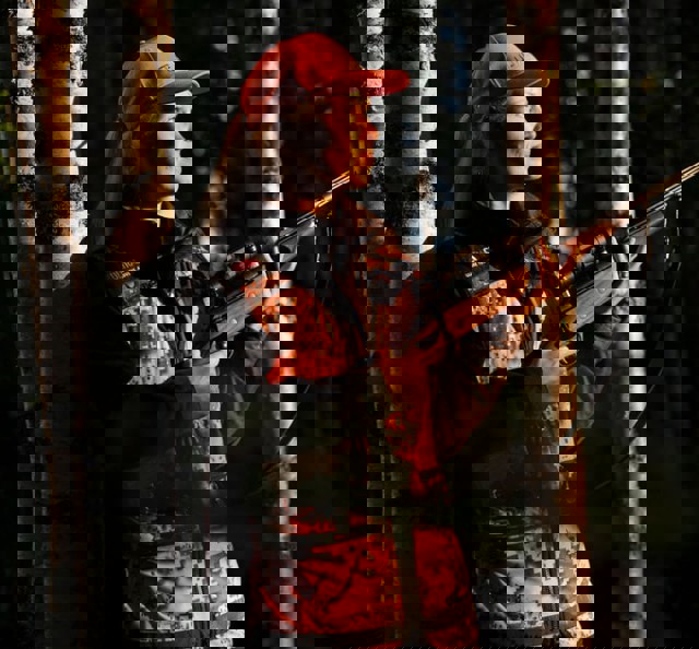 Woman with rifle